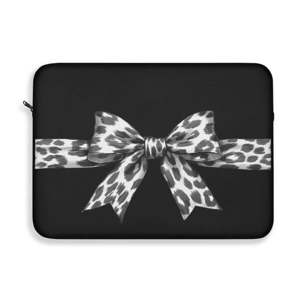 precious 15 in laptop sleeve with a leopard print bow on a white background